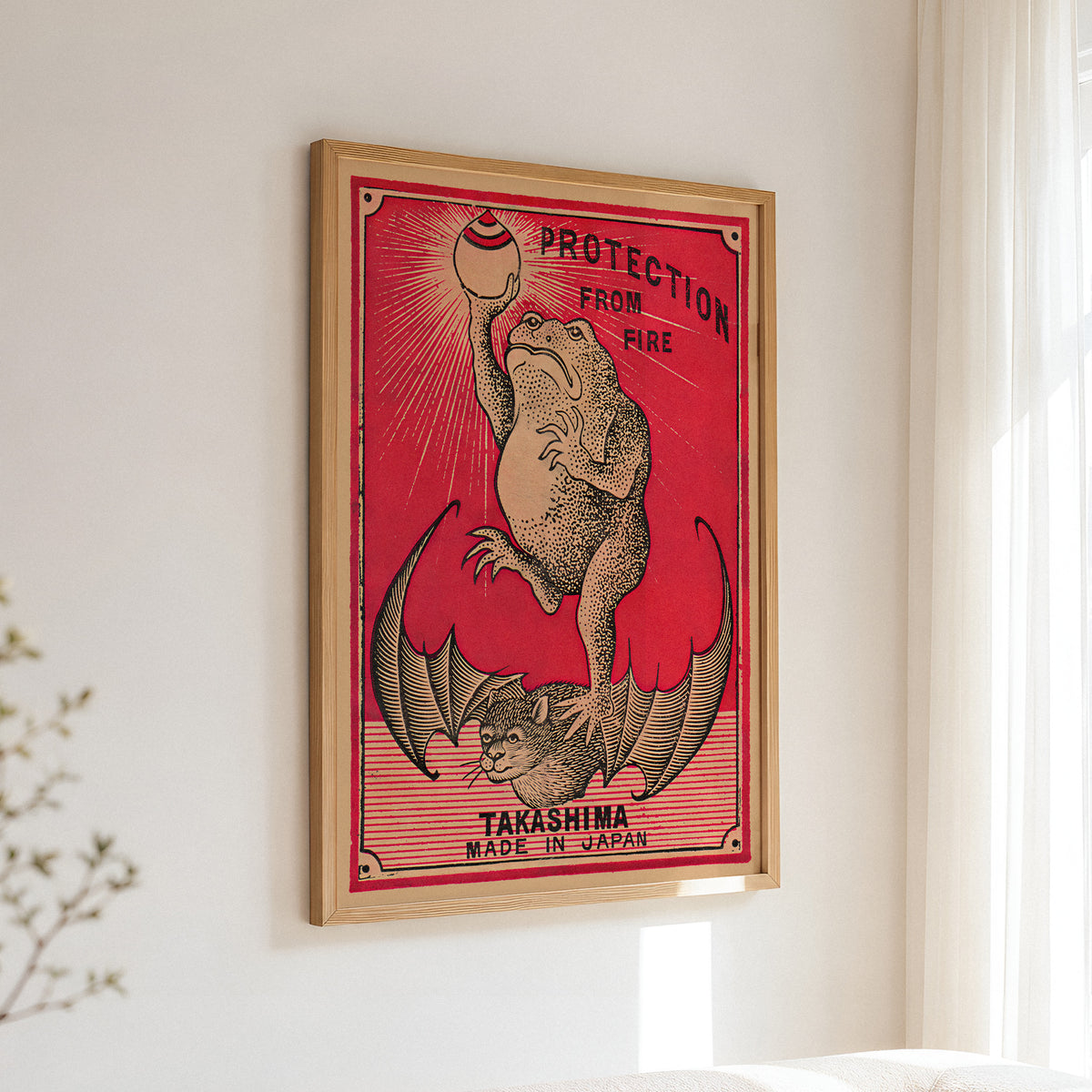 Frog Protection from Fire art print displayed in an interior, featuring a frog and vintage fire-protection graphics.